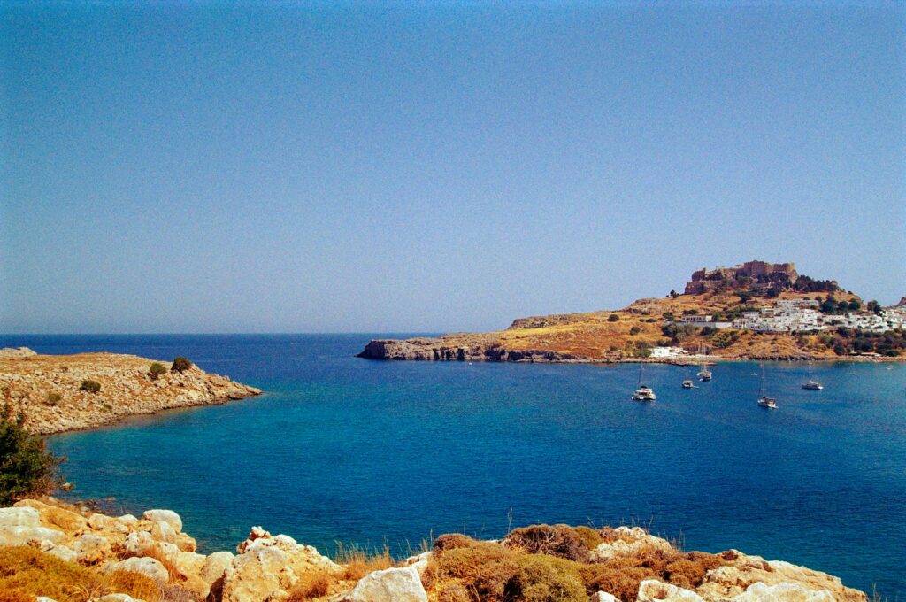 A blue body of water surrounded by land